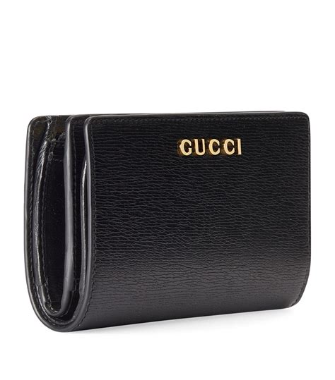 Zip around wallet with Gucci script 